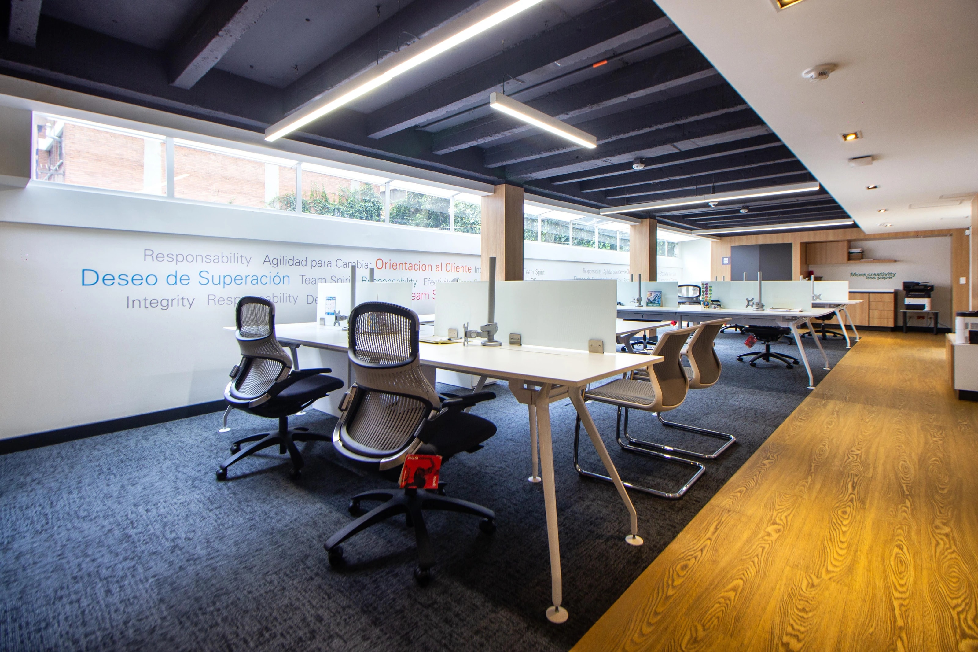 Modern workplace with desks and meeting space