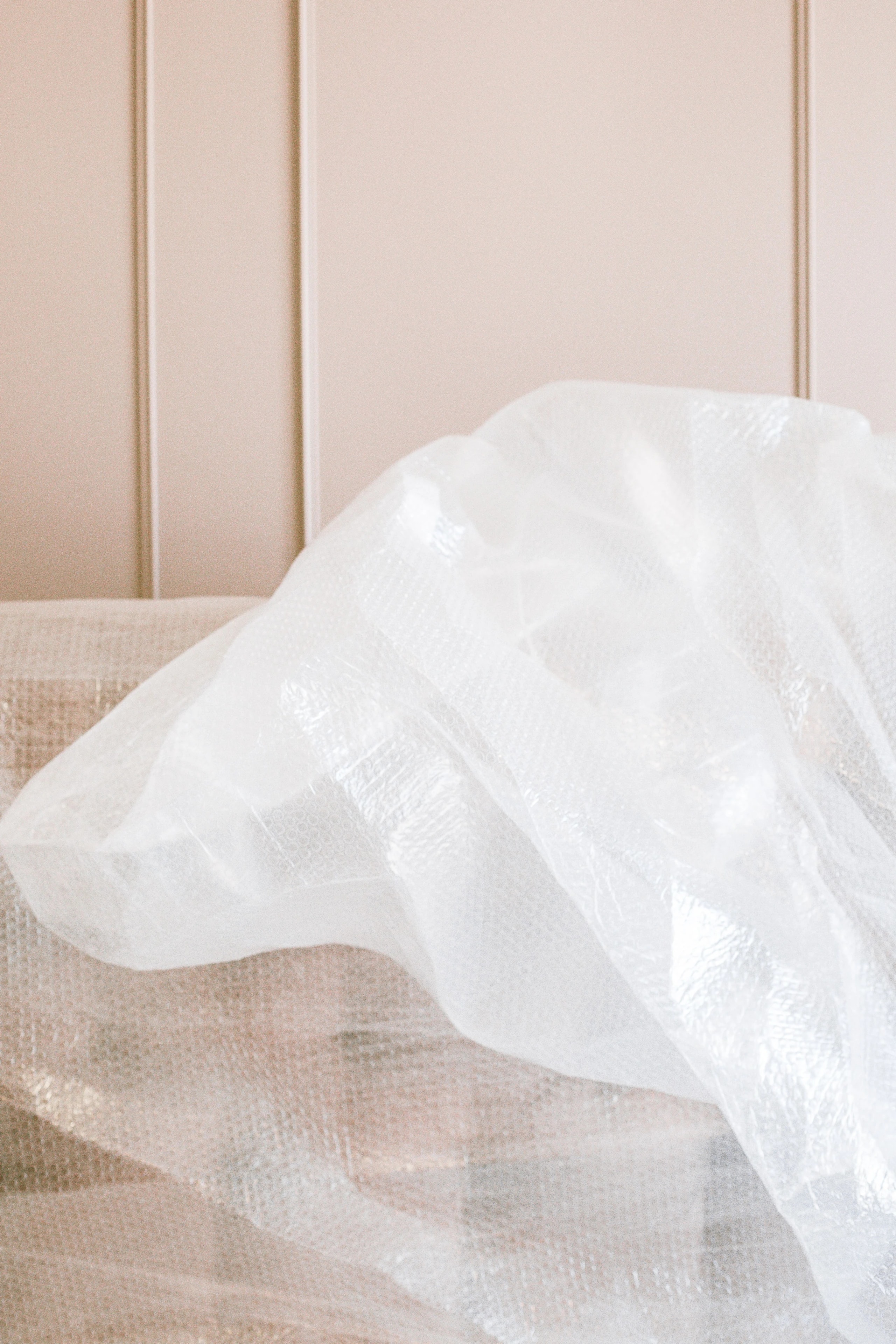 Upholstered furniture protected with wrapping