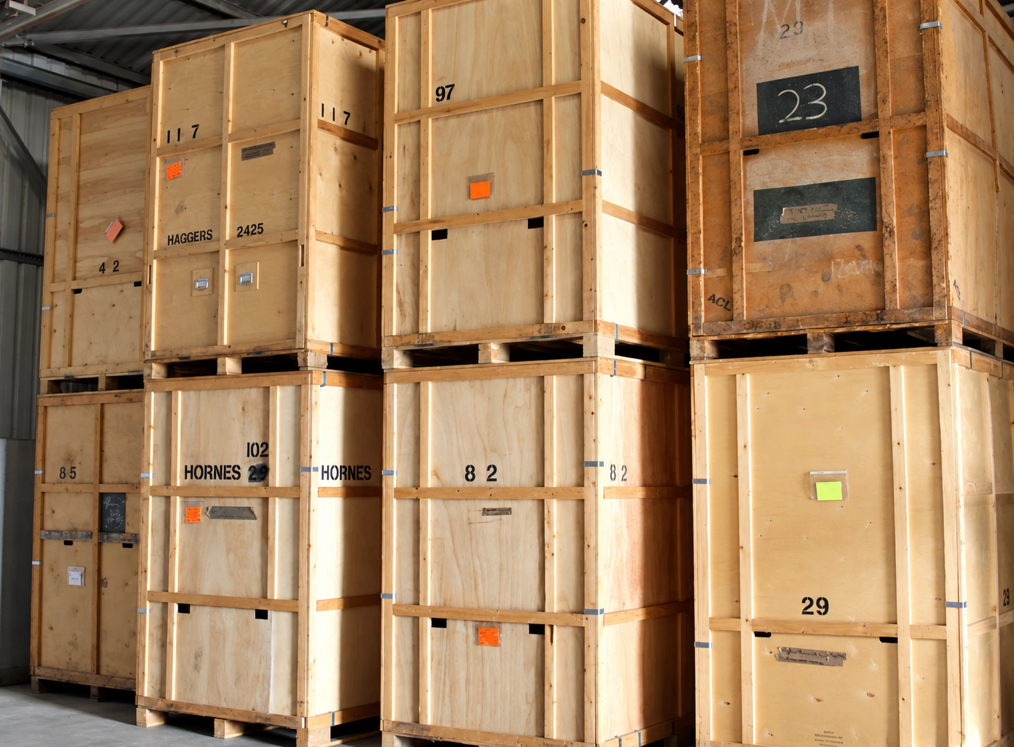Wooden storage crates arranged in a warehouse